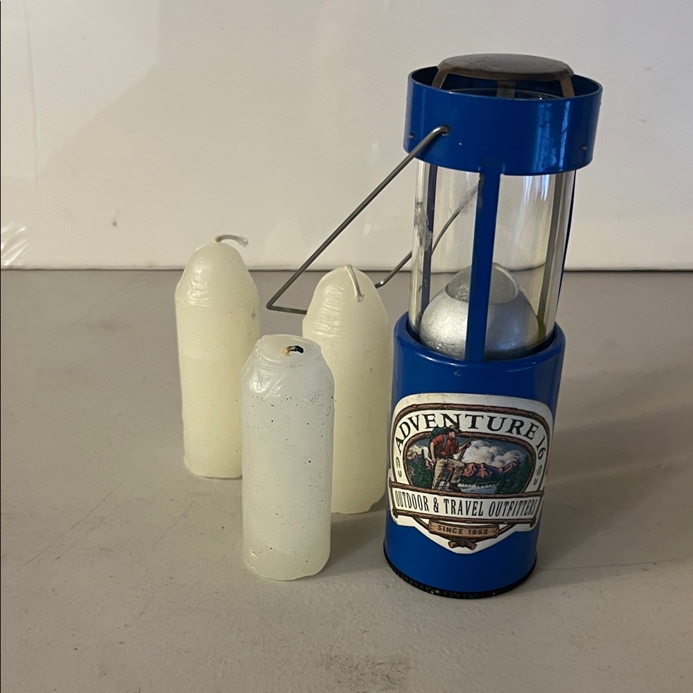 Vintage Blue Adventure 16 Outdoor & Travel Outfitters Lantern with White Candles